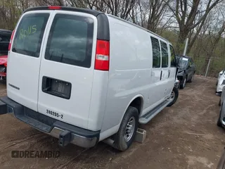 2021 Chevrolet Express Cargo Van with VIN 1GCWGAF77M1204620, listed as a IAAI auction lot 41933567 with 51,880 mi miles. Bid and sale history available at carsss.com. Image 4.