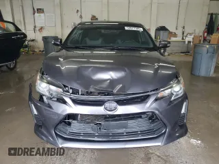 2015 Scion tC with VIN JTKJF5C70FJ002254, listed as a Copart auction lot 53077385 with 117,221 mi miles and Salvage Title. Bid and sale history available at carsss.com. Image 5.