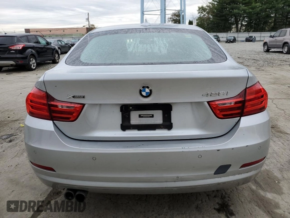 2015 BMW 4 Series 428i xDrive with VIN WBA4C9C5XFG135391, listed as a Copart auction lot 70753653 with 70,870 mi miles and . Bid and sale history available at DreamBid. Image 6.