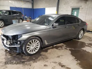 2018 BMW 7 Series 740i xDrive with VIN WBA7E4C5XJGV24275, listed as a Copart auction lot 48987063 with 48,864 mi miles. Bid and sale history available at carsss.com. Image 1.