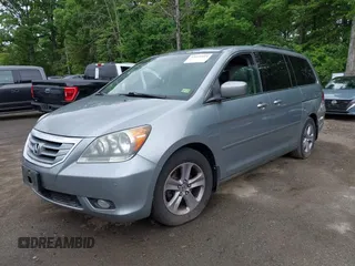 2008 Honda Odyssey Touring with VIN 5FNRL38908B066127, listed as a IAAI auction lot 42219444 with 188,868 mi miles and . Bid and sale history available at DreamBid. Image 2.