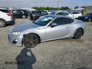 2013 Scion FR-S z VIN JF1ZNAA10D2703426, wystawiony jako Copart lot #55443135 z przebiegiem 283 925 mil mil oraz Szkoda całkowita • Salvage title. Historia ofert i sprzedaży dostępna na DreamBid. Obrazek 1.