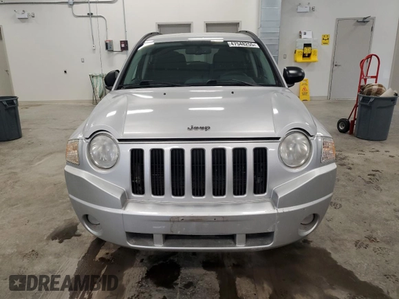 2010 Jeep Compass Sport with VIN 1J4NF4FB4AD512613, listed as a Copart auction lot 47548255 with 123,149 mi miles and Clean Title. Bid and sale history available at carsss.com. Image 5.
