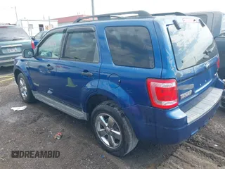 2008 Ford Escape XLT with VIN 1FMCU93168KE20965, listed as a IAAI auction lot 41896992 with 242,835 mi miles. Bid and sale history available at carsss.com. Image 3.