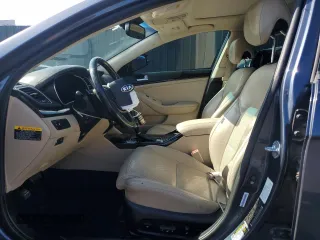 2014 Kia Cadenza Premium with VIN KNALN4D71E5153863, listed as a Copart auction lot 73567824 with 116,308 mi miles and Salvage Title. Bid and sale history available at carsss.com. Image 7.