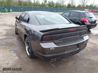 2014 Dodge Charger SE with VIN 2C3CDXBG8EH357664, listed as a IAAI auction lot 41860609 with 94,918 mi miles. Bid and sale history available at carsss.com. Image 3.
