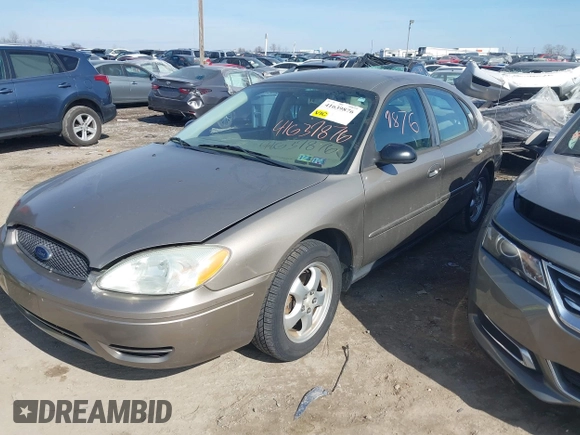 2004 Ford Taurus SE with VIN 1FAFP532X4G152810, listed as a IAAI auction lot 41639876 with 98,718 mi miles and . Bid and sale history available at DreamBid. Image 2.