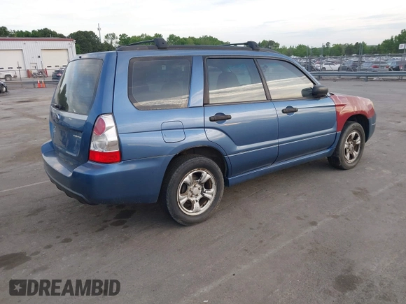 2007 Subaru Forester X with VIN JF1SG63617G722723, listed as a IAAI auction lot 42086601 with 204,766 mi miles. Bid and sale history available at carsss.com. Image 4.