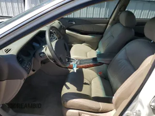2000 Acura TL with VIN 19UUA5660YA037130, listed as a Copart auction lot 52930485 with 206,501 mi miles and Salvage Title. Bid and sale history available at carsss.com. Image 7.