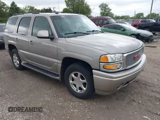 2003 GMC Yukon Denali z VIN 1GKEK63U23J235651, wystawiony jako IAAI lot #42319019 z przebiegiem 159 238 mil mil oraz . Historia ofert i sprzedaży dostępna na DreamBid. Obrazek 1.