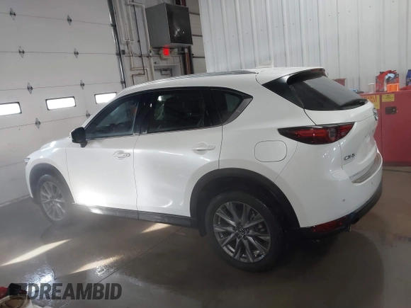 2021 Mazda CX-5 Grand Touring with VIN JM3KFADM3M0312143, listed as a IAAI auction lot 41606582 with 46,515 mi miles. Bid and sale history available at carsss.com. Image 14.