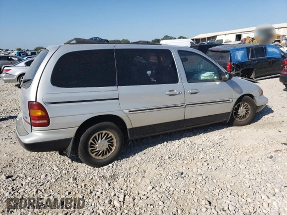 1998 Ford Windstar LX z VIN 2FMZA5145WBC60920, wystawiony jako Copart lot #71553874 z przebiegiem 232 744 mil mil oraz Nie do naprawy. Historia ofert i sprzedaży dostępna na DreamBid. Obrazek 3.