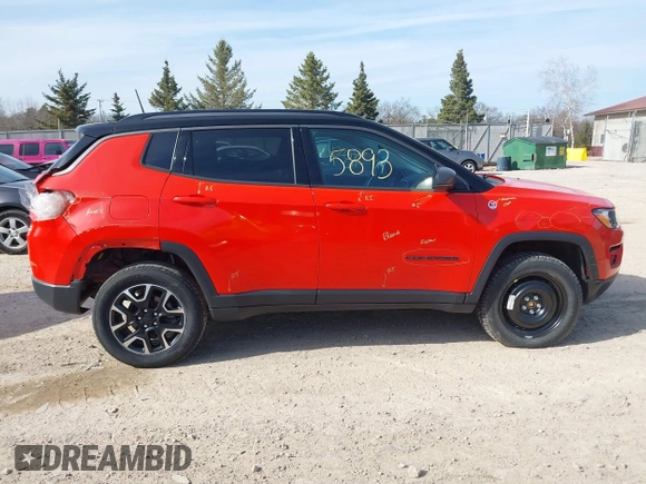 2020 Jeep Compass Trailhawk with VIN 3C4NJDDB2LT142394, listed as a IAAI auction lot 42055893 with 54,490 mi miles and . Bid and sale history available at carsss.com. Image 14.