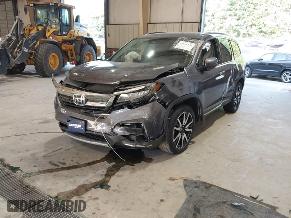 2021 Honda Pilot Touring 8-Passenger with VIN 5FNYF6H95MB048527, listed as a IAAI auction lot 42542138 with 40,584 mi miles and . Bid and sale history available at DreamBid. Image 18.