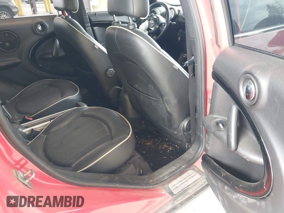 2012 MINI Countryman S with VIN WMWZC5C51CWL56989, listed as a IAAI auction lot 42195253 with 105,750 mi miles and . Bid and sale history available at DreamBid. Image 8.