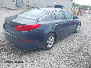2015 Kia Optima LX z VIN KNAGM4A74F5575202, wystawiony jako IAAI lot #42247021 z przebiegiem 160 023 mil mil oraz . Historia ofert i sprzedaży dostępna na DreamBid. Obrazek 4.