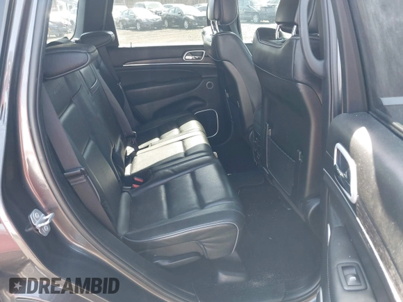 2019 Jeep Grand Cherokee Summit with VIN 1C4RJFJG1KC637757, listed as a IAAI auction lot 41803356 with 95,231 mi miles. Bid and sale history available at carsss.com. Image 8.