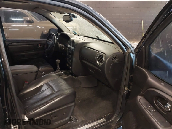 2007 GMC Envoy SLE with VIN 1GKDT13S872298442, listed as a IAAI auction lot 41343565 with 106,818 mi miles. Bid and sale history available at carsss.com. Image 5.