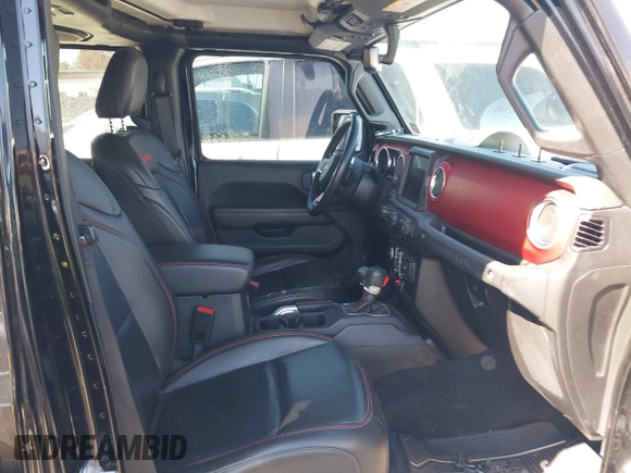 2019 Jeep Wrangler Unlimited Rubicon with VIN 1C4HJXFN1KW679028, listed as a IAAI auction lot 41654887 with 32,247 mi miles and . Bid and sale history available at DreamBid. Image 5.