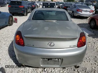 2004 Lexus SC 430 with VIN JTHFN48Y240051291, listed as a Copart auction lot 77631944 with 169,055 mi miles and Salvage Title. Bid and sale history available at DreamBid. Image 6.