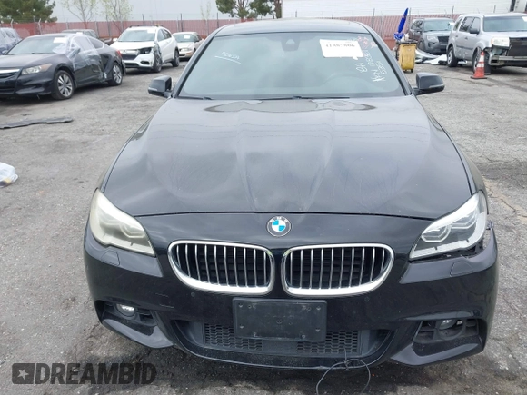 2015 BMW 5 Series 535i with VIN WBA5B1C55FG128387, listed as a IAAI auction lot 41885806 with 94,734 mi miles and . Bid and sale history available at carsss.com. Image 6.