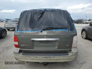 2004 Kia Sedona LX with VIN KNDUP131346575851, listed as a Copart auction lot 73614194 with 153,928 mi miles and Salvage Title. Bid and sale history available at carsss.com. Image 6.