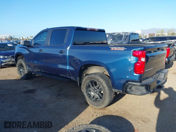 2023 Chevrolet Silverado 1500 LT Trail Boss with VIN 3GCUDFE8XPG152588, listed as a IAAI auction lot 41824795 with 21,903 mi miles and . Bid and sale history available at DreamBid. Image 3.