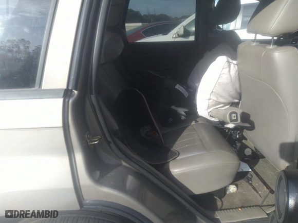 2005 Jeep Grand Cherokee Laredo with VIN 1J4HS48N95C677083, listed as a IAAI auction lot 41452025 with 236,773 mi miles. Bid and sale history available at carsss.com. Image 12.