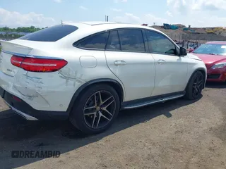 2016 Mercedes-Benz GLE 450 AMG with VIN 4JGED6EB9GA021405, listed as a IAAI auction lot 42376376 with 112,297 mi miles and . Bid and sale history available at DreamBid. Image 4.