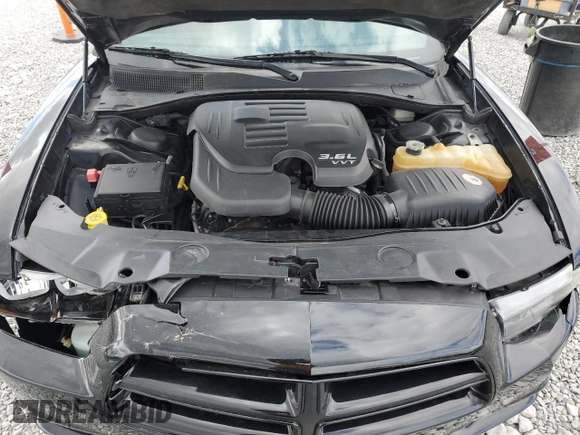 2013 Dodge Charger SXT z VIN 2C3CDXJG2DH615726, wystawiony jako Copart lot #53116535 z przebiegiem 304 919 mil mil oraz Szkoda całkowita • Salvage title. Historia ofert i sprzedaży dostępna na DreamBid. Obrazek 11.
