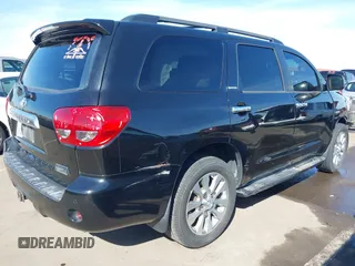 2014 Toyota Sequoia Limited with VIN 5TDKY5G13ES055656, listed as a IAAI auction lot 41616322 with 118,859 mi miles. Bid and sale history available at carsss.com. Image 4.
