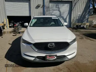 2019 Mazda CX-5 Grand Touring with VIN JM3KFADM4K1674408, listed as a Copart auction lot 47684015 with 77,554 mi miles and Salvage Title. Bid and sale history available at carsss.com. Image 11.