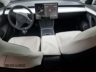 2023 Tesla Model 3 with VIN 5YJ3E1EA5PF640805, listed as a Copart auction lot 48389265 with 28,193 mi miles and Salvage title. Bid and sale history available at DreamBid. Image 8.