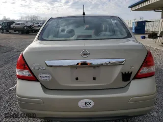 2007 Nissan Versa 1.8 S with VIN 3N1BC11E67L454060, listed as a Copart auction lot 86876104 with 100,485 mi miles and Salvage Title. Bid and sale history available at carsss.com. Image 6.