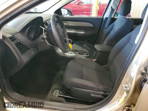 2010 Chrysler Sebring Touring with VIN 1C3CC4FB2AN183821, listed as a Copart auction lot 55239615 with 26,094 mi miles and Salvage Title. Bid and sale history available at DreamBid. Image 7.