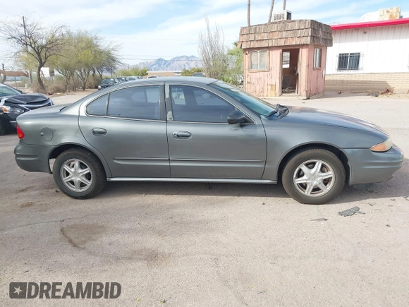 2004 Oldsmobile Alero GL1 z VIN 1G3NL52F84C124744, wystawiony jako IAAI lot #41916407 z przebiegiem 164 660 mil mil oraz . Historia ofert i sprzedaży dostępna na DreamBid. Obrazek 13.
