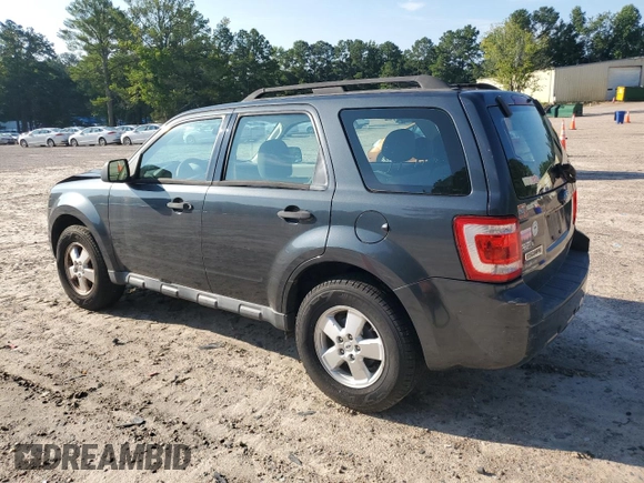 2009 Ford Escape XLS with VIN 1FMCU02739KD07929, listed as a Copart auction lot 64861745 with 144,914 mi miles and Clean title. Bid and sale history available at DreamBid. Image 2.