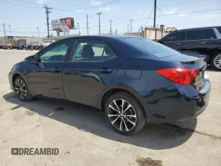 2019 Toyota Corolla L with VIN 2T1BURHE1KC130475, listed as a Copart auction lot 57521325 with 139,033 mi miles and Salvage Title. Bid and sale history available at DreamBid. Image 2.