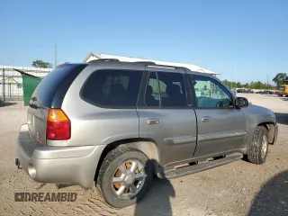 2002 GMC Envoy SLT with VIN 1GKDT13S322420861, listed as a Copart auction lot 63408164 with 250,167 mi miles and Salvage Title. Bid and sale history available at carsss.com. Image 3.