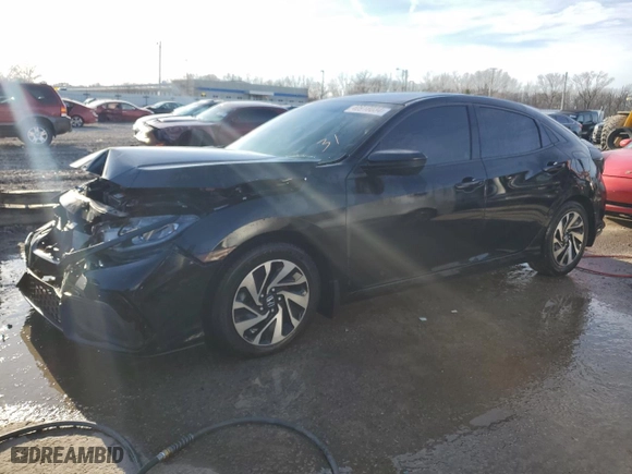 2018 Honda Civic Hatchback LX with VIN SHHFK7H2XJU220718, listed as a Copart auction lot 87921935 with 52,879 mi miles and Non Repairable. Bid and sale history available at carsss.com. Image 1.