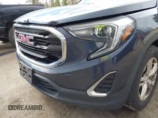 2018 GMC Terrain SLE z VIN 3GKALTEV9JL380224, wystawiony jako IAAI lot #41996361 z przebiegiem 196 507 mil mil oraz . Historia ofert i sprzedaży dostępna na DreamBid. Obrazek 21.
