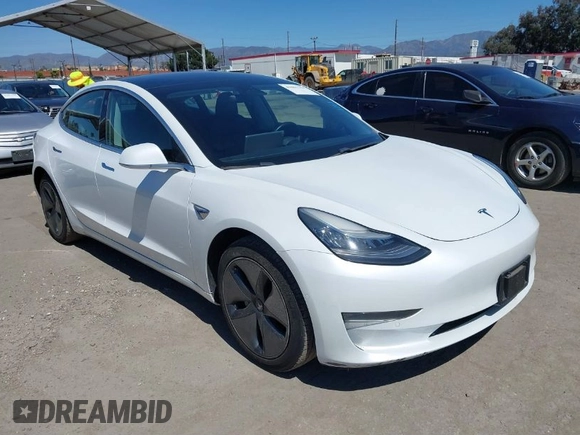 2019 Tesla Model 3 Mid Range with VIN 5YJ3E1EA1KF422983, listed as a IAAI auction lot 41861334 with 53,017 mi miles. Bid and sale history available at carsss.com. Image 1.