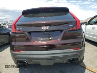 2020 Cadillac XT4 FWD Luxury z VIN 1GYAZAR40LF059910, wystawiony jako Copart lot #55426065 z przebiegiem 36 590 mil mil oraz Szkody całkowita. Historia ofert i sprzedaży dostępna na DreamBid. Obrazek 6.