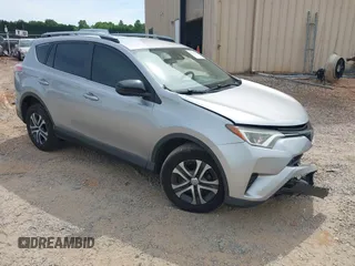 2018 Toyota RAV4 LE z VIN JTMBFREV9JJ257072, wystawiony jako IAAI lot #42211287 z przebiegiem 147 660 mil mil oraz . Historia ofert i sprzedaży dostępna na DreamBid. Obrazek 1.