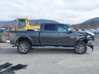 2016 Ram 2500 Laramie Longhorn with VIN 3C6UR5GLXGG330200, listed as a IAAI auction lot 40861684 with 79,427 mi miles and . Bid and sale history available at DreamBid. Image 13.