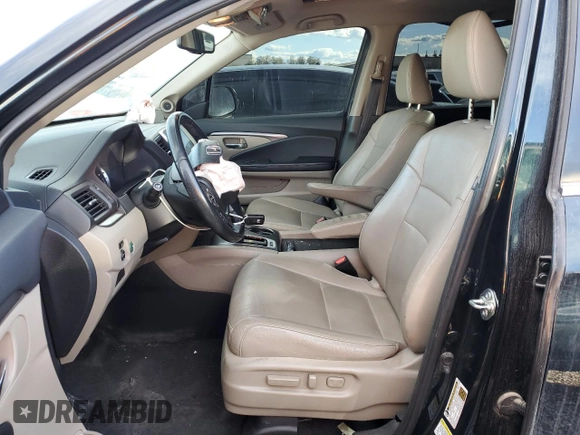 2016 Honda Pilot EX-L with VIN 5FNYF6H72GB106385, listed as a Copart auction lot 44000395 with 128,520 mi miles and Salvage Title. Bid and sale history available at carsss.com. Image 7.