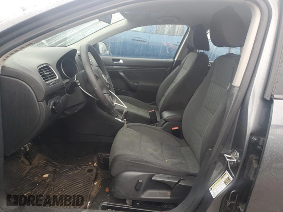 2010 Volkswagen Jetta S with VIN 3VWKZ7AJ2AM623887, listed as a Copart auction lot 84193724 with 148,275 mi miles and Salvage title. Bid and sale history available at DreamBid. Image 7.