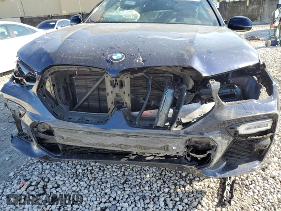 2021 BMW X6 M50i with VIN 5UXCY8C09M9E66884, listed as a Copart auction lot 63025622 with 26,220 mi miles and Salvage Title. Bid and sale history available at carsss.com. Image 9.