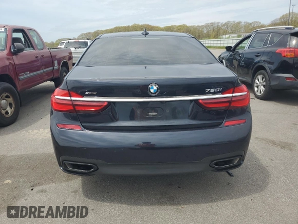 2019 BMW 7 Series 750i xDrive с VIN WBA7F2C5XKB240094, выставлен на аукционе Copart как лот 52735614 с пробегом 54 983 миль миль и Списание • Salvage title. История ставок и продаж доступна на DreamBid. Изображение 6.
