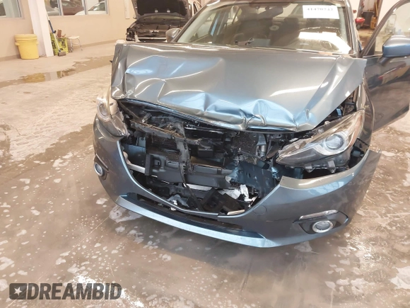 2014 Mazda 3 S Grand Touring with VIN JM1BM1W31E1182703, listed as a IAAI auction lot 41470742 with 123,956 mi miles and . Bid and sale history available at DreamBid. Image 6.